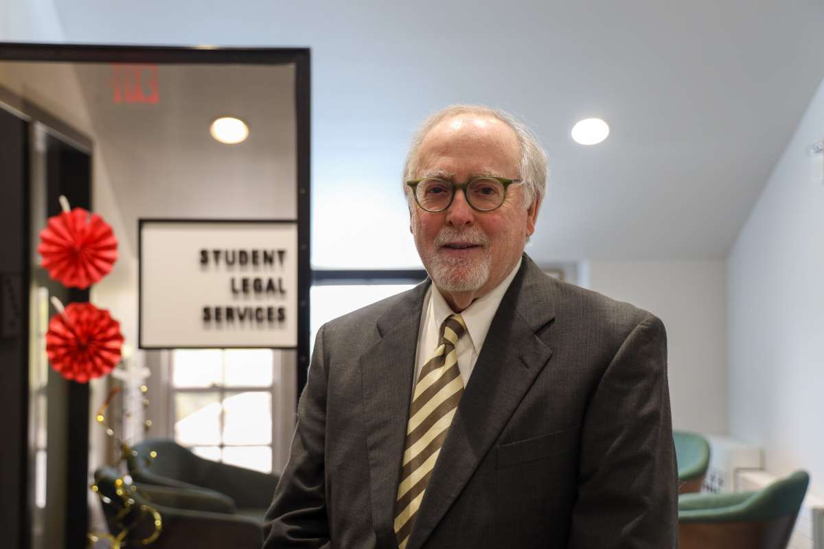 SLS Attorney Michael Levine standing in front of the Student Legal Services Office